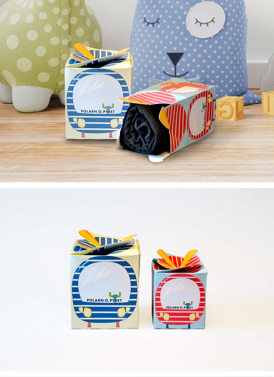 presentförpackning för barn. Lådorna är dekorerade med en helikopterillustration och låsningen i toppen är propellen.